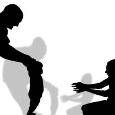 parents-and-child-in-silhouette